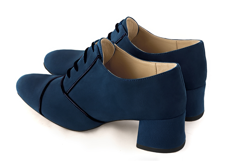 French elegance and refinement for these navy blue and gloss black essential lace-up shoes, 
                available in many subtle leather and colour combinations. This pretty flat lace-up model will enhance your most basic outfits.
To be personalised or not with your own colours and materials.  
                Matching clutches for parties, ceremonies and weddings.   
                You can customize these lace-up shoes to perfectly match your tastes or needs, and have a unique model.  
                Choice of leathers, colours, knots and heels. 
                Wide range of materials and shades carefully chosen.  
                Rich collection of flat, low, mid and high heels.  
                Small and large shoe sizes - Florence KOOIJMAN